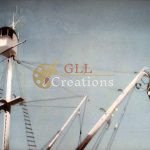 Ship's Mast and Rigging Against a Clear Sky