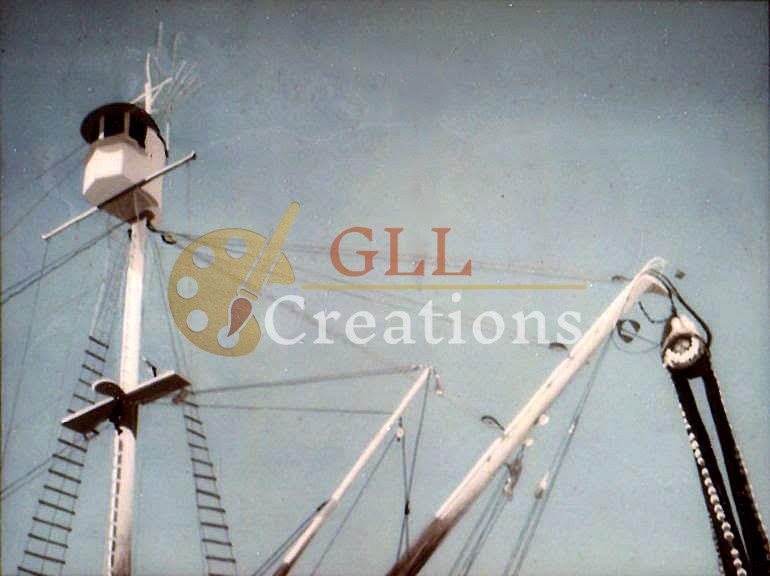 Ship's Mast and Rigging Against a Clear Sky